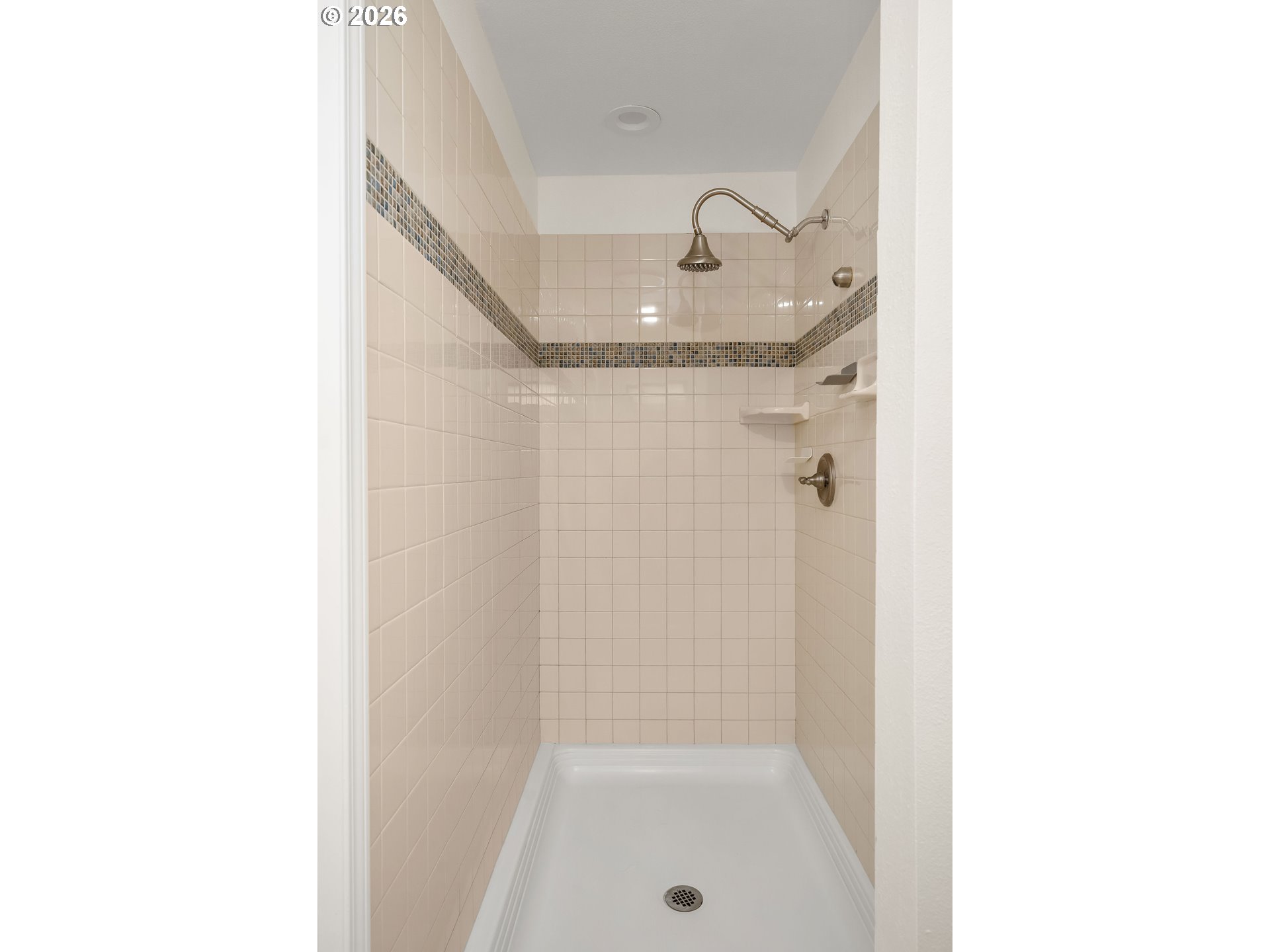 5844 Southwest Ralston Drive Portland, OR 97239 - Photo 23 of 43 a bathroom with a sink and shower