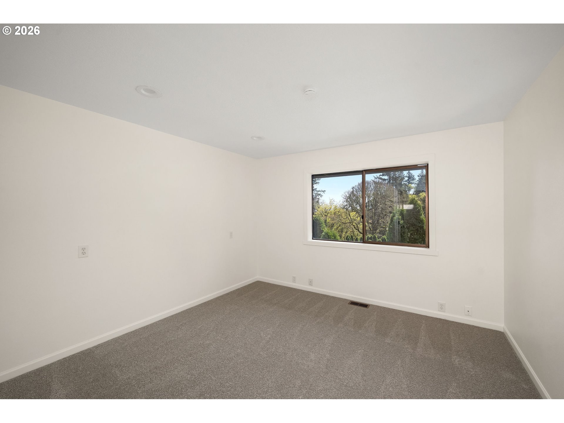 5844 Southwest Ralston Drive Portland, OR 97239 - Photo 26 of 43 a view of an empty room