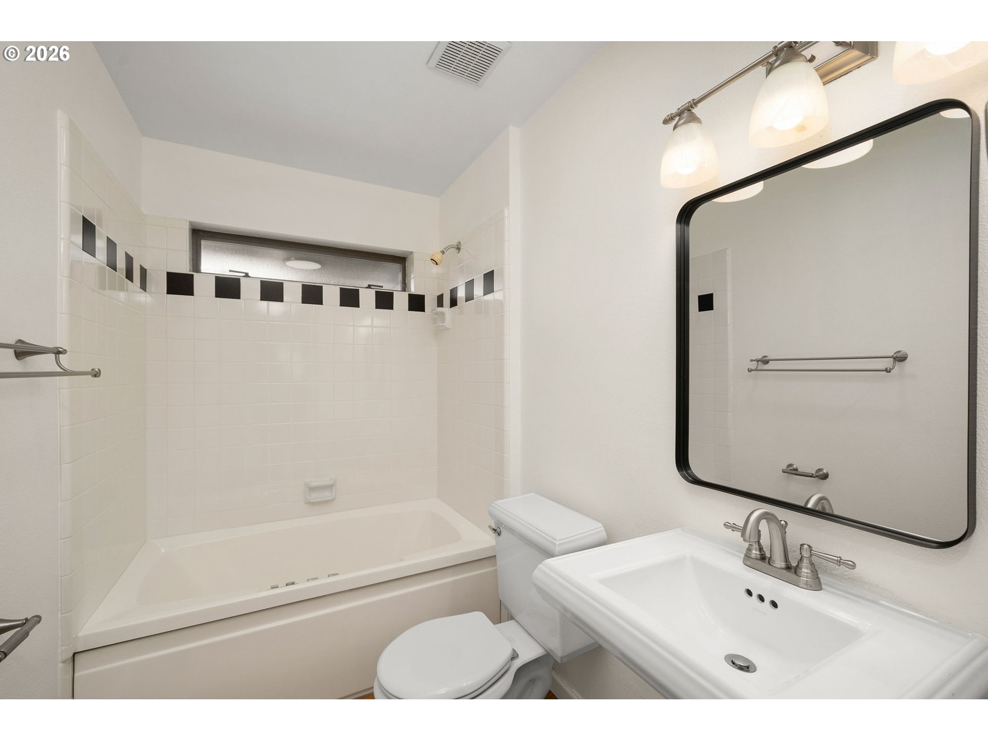 5844 Southwest Ralston Drive Portland, OR 97239 - Photo 27 of 43 a bathroom with a bathtub shower sink and toilet