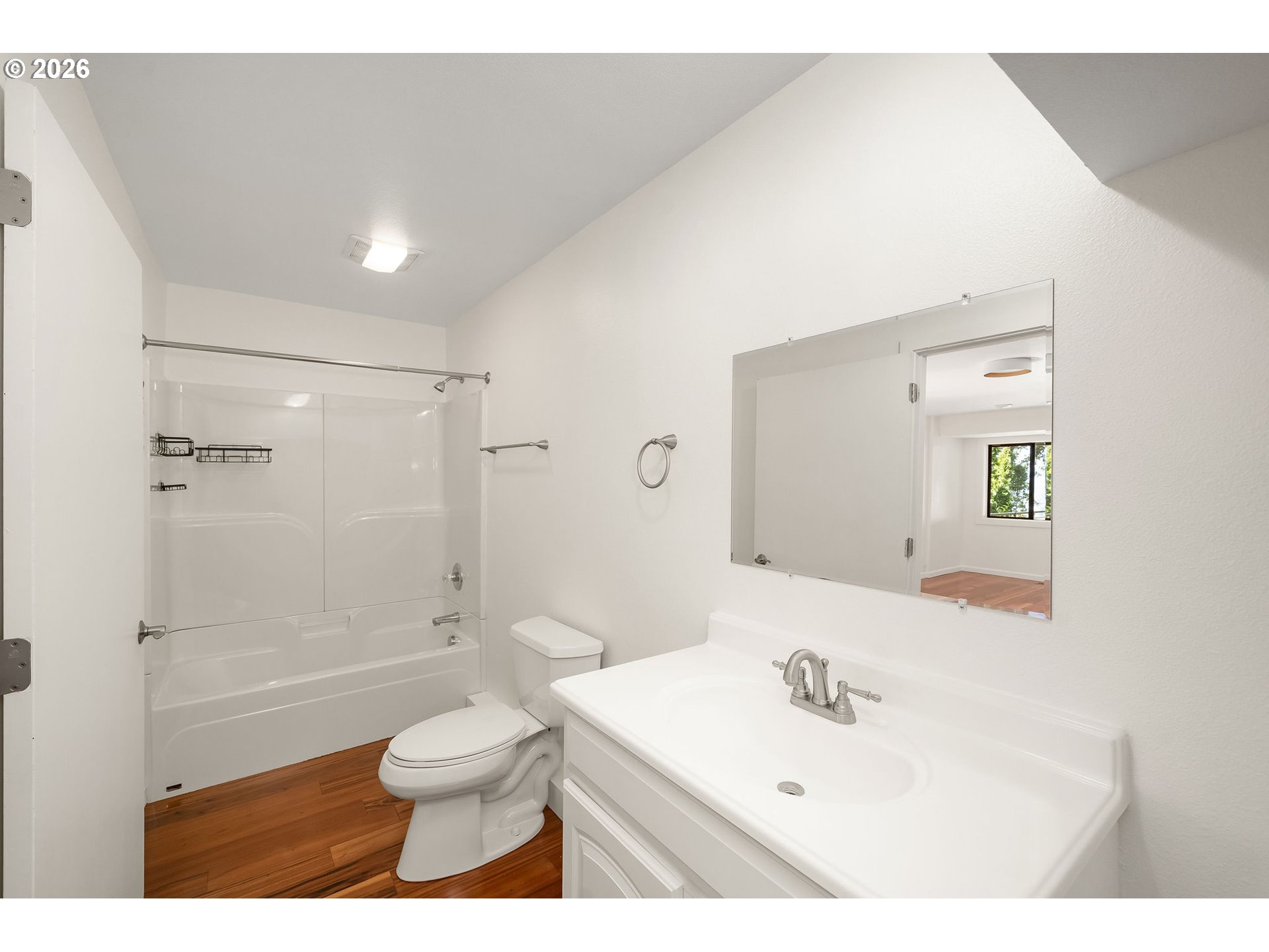 5844 Southwest Ralston Drive Portland, OR 97239 - Photo 33 of 43 a bathroom with a sink a toilet and shower