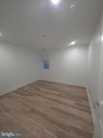 a bathroom with a toilet sink and shower