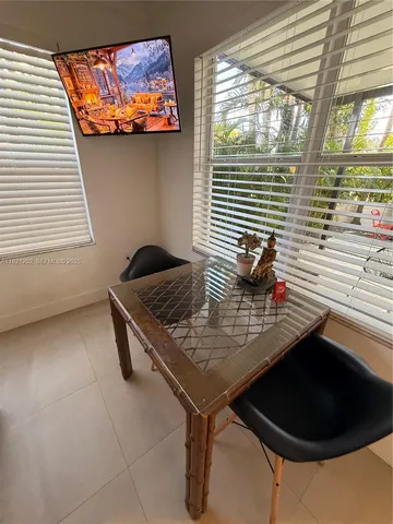 a bathroom with a sink a mirror and vanity