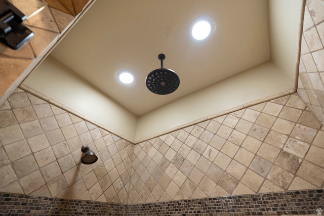 687 South 2080th Street East Springville, UT 84663 - Photo 38 of 149 Custom shower with a ceiling-mounted rainfall showerhead and a wall-mounted showerhead