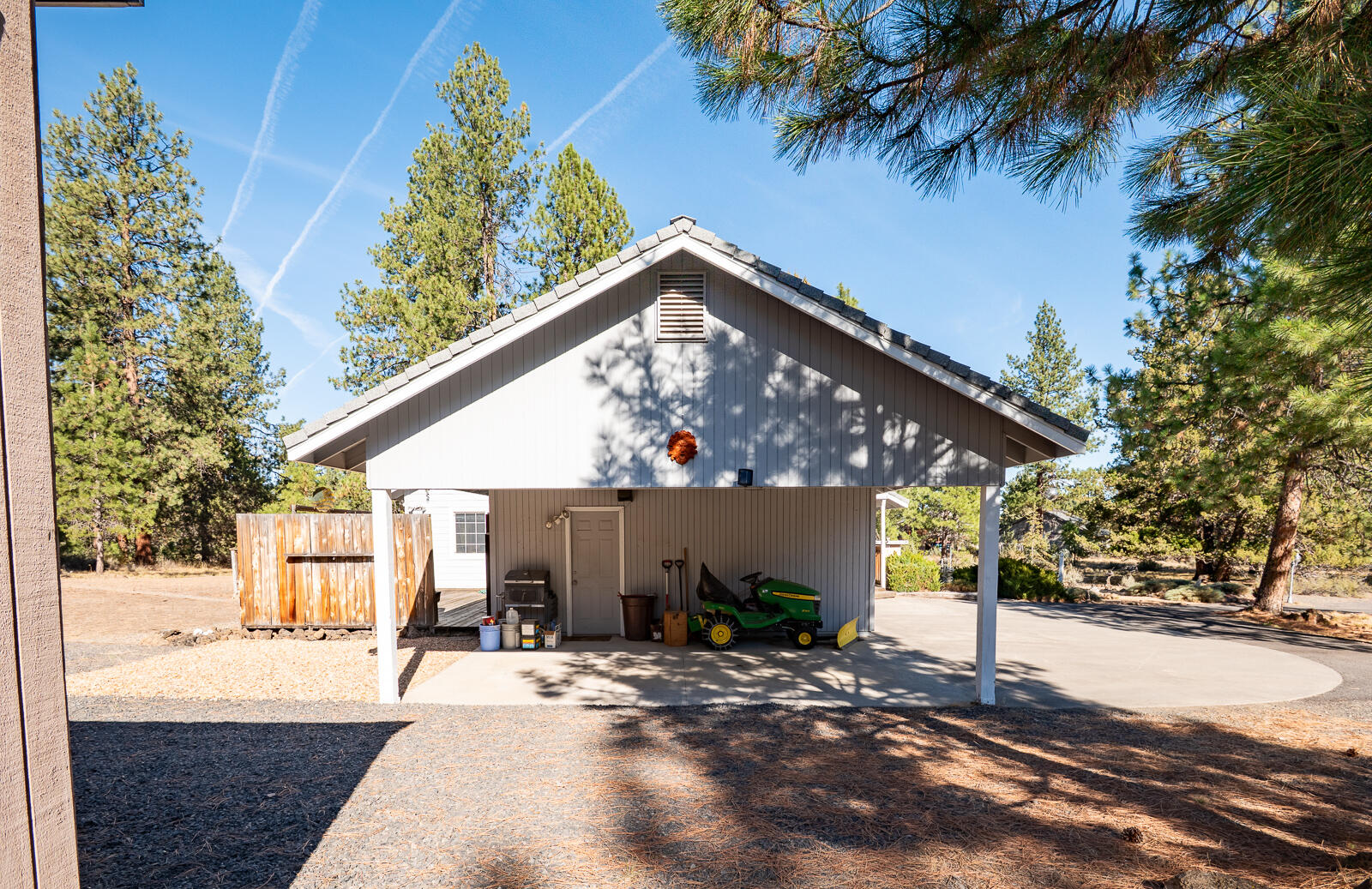 19793 Buck Canyon Road Bend, OR 97702 - Photo 19 of 33 a view of a house with a yard