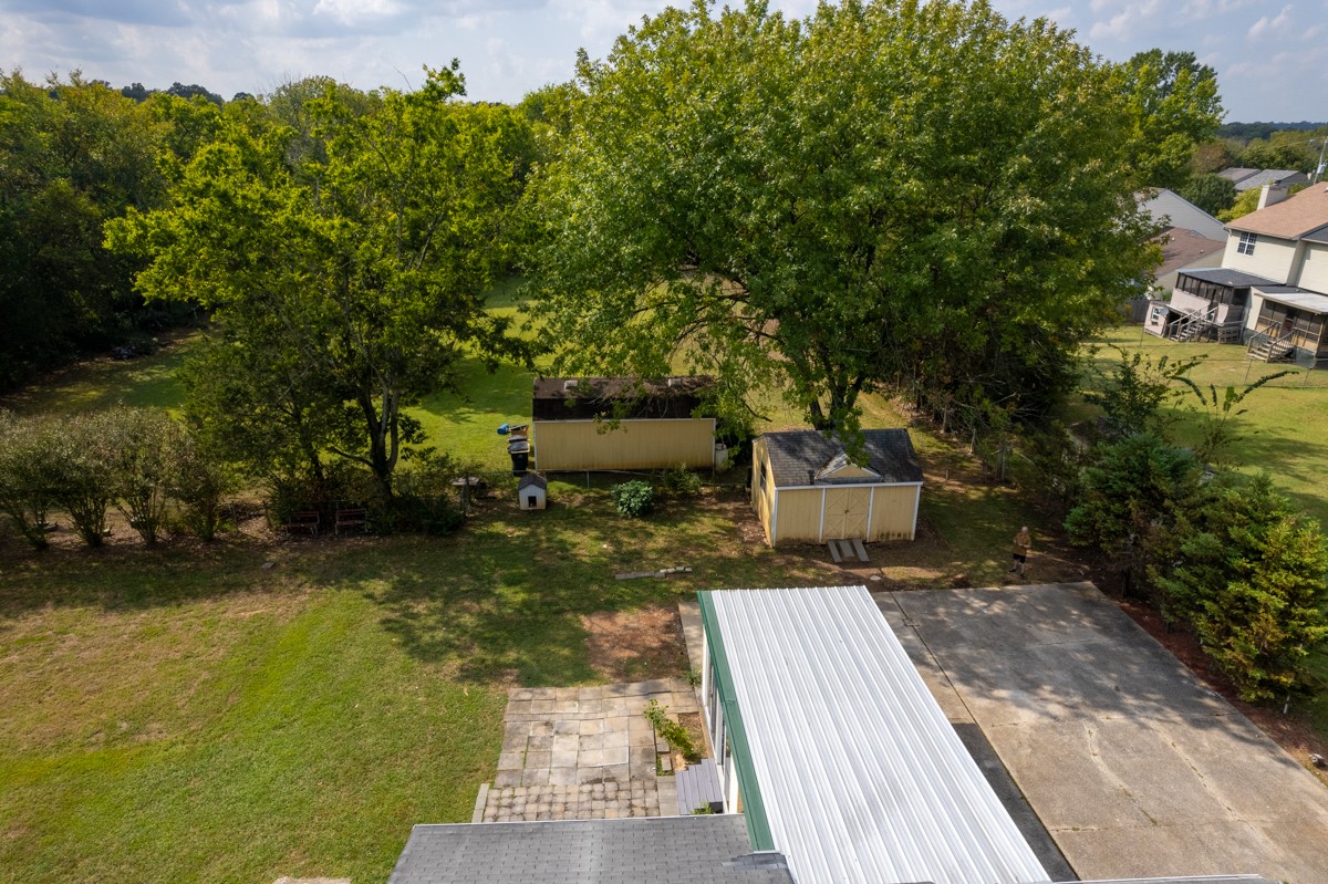 3228 Anderson Road Antioch, TN 37013 - Photo 46 of 61 a view of a yard with plants and a bench