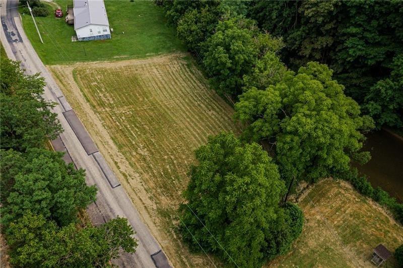 0 Toms Run Road Holbrook, PA 15352 - Photo 11 of 22 a view of an outdoor space and a yard