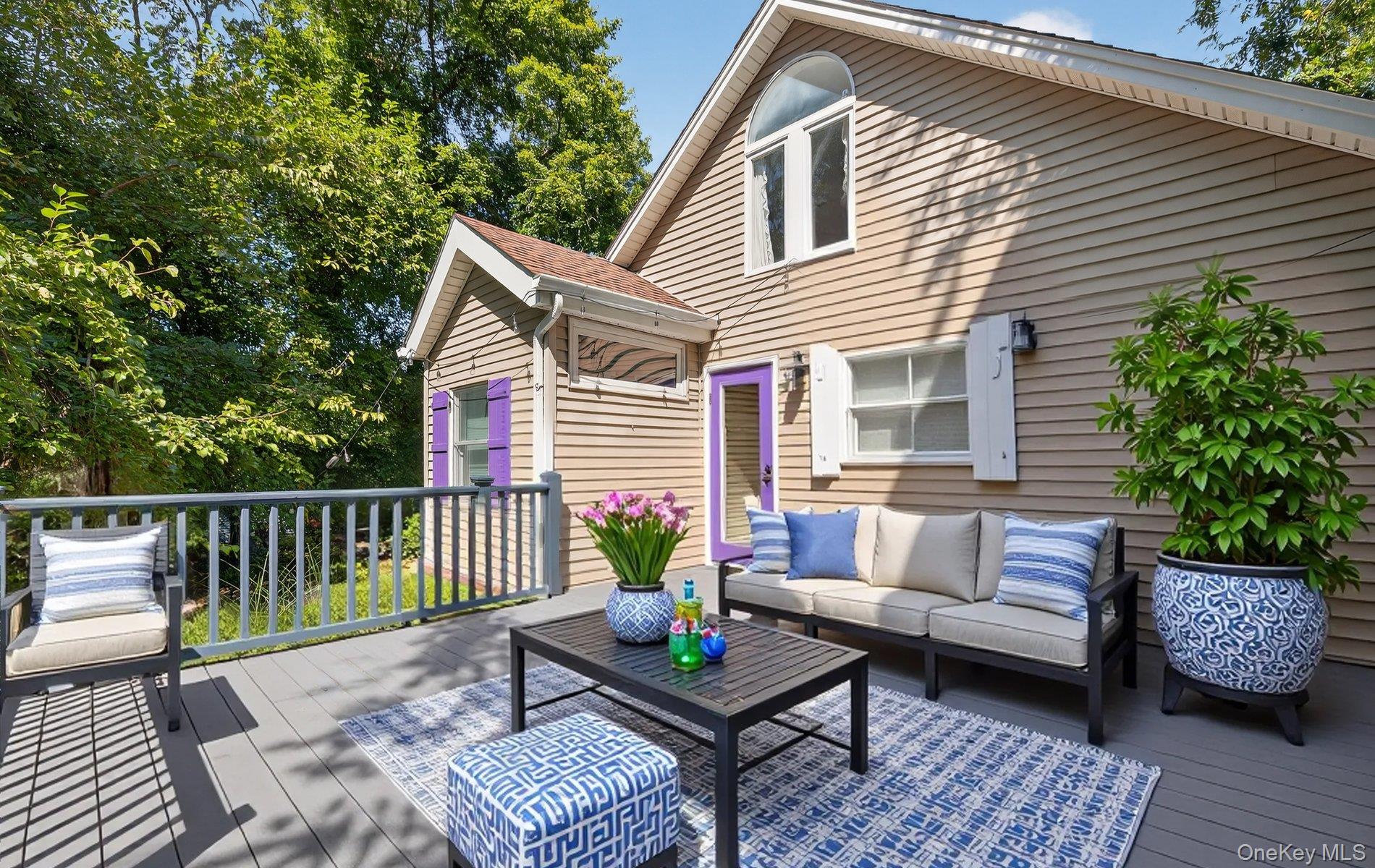 70 Shell Road Rocky Point, NY 11778 - Photo 19 of 31 Wooden deck with an outdoor hangout area