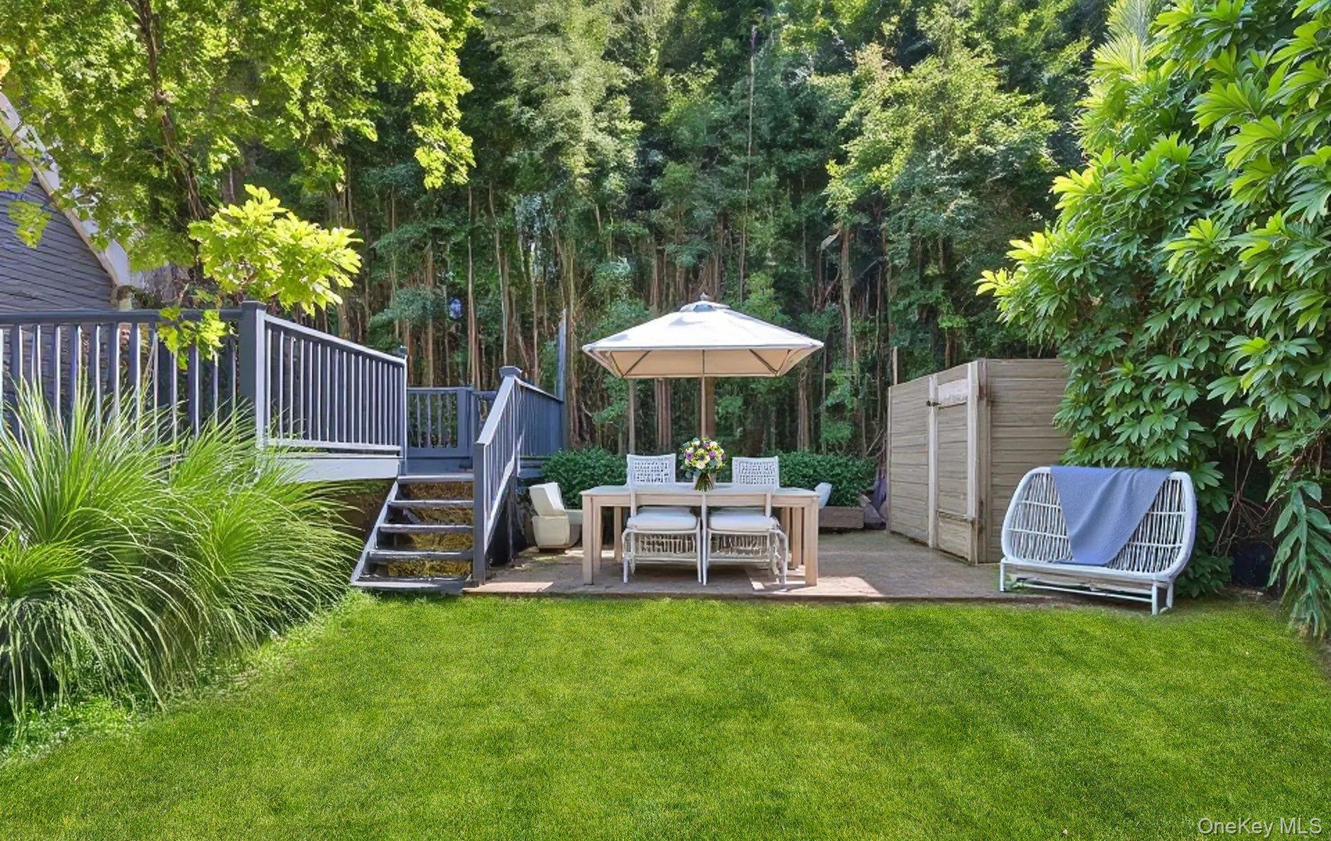 70 Shell Road Rocky Point, NY 11778 - Photo 20 of 31 View of green lawn with a patio, a gazebo, stairway, and a deck