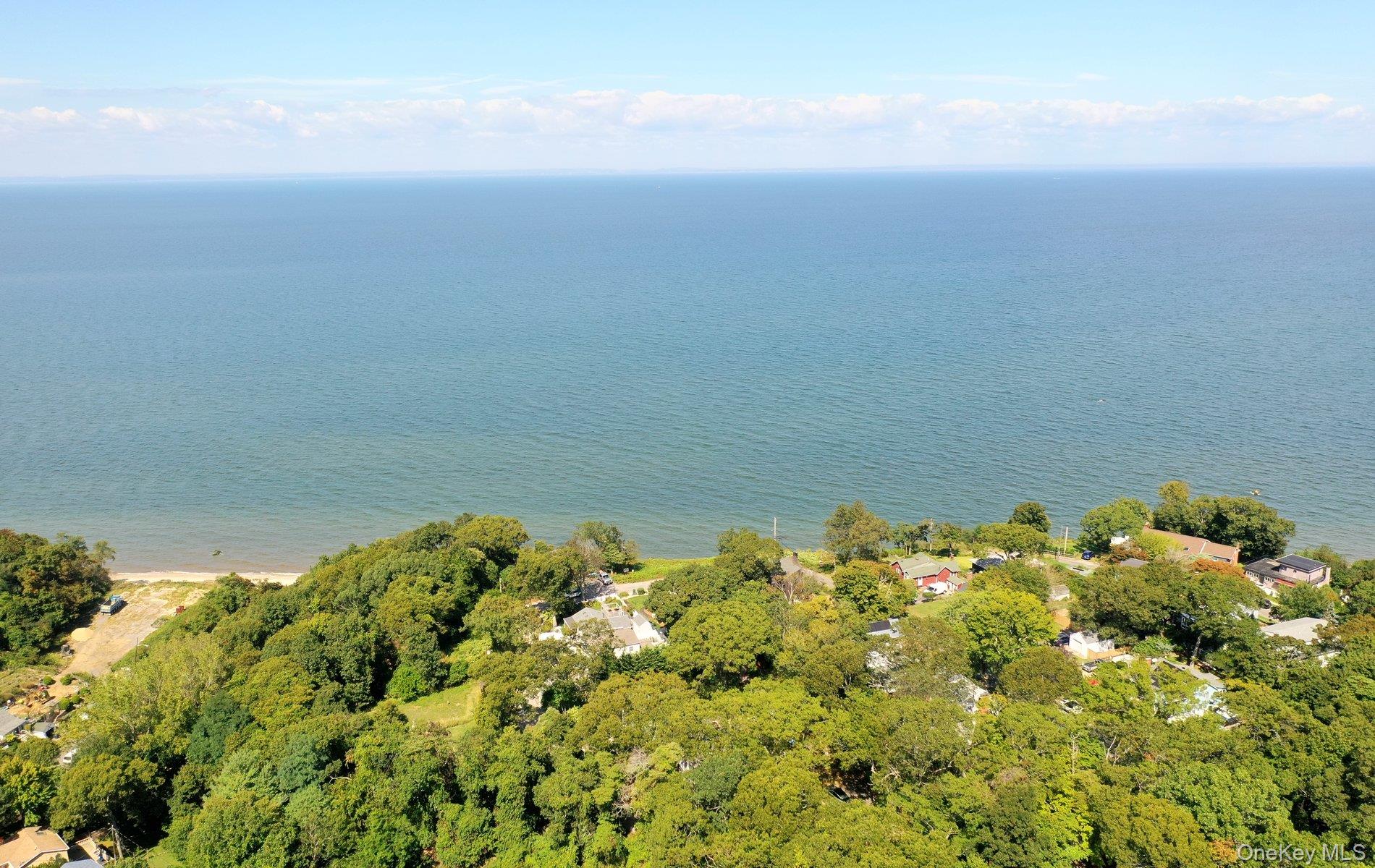70 Shell Road Rocky Point, NY 11778 - Photo 27 of 31 Aerial view of property and surrounding area featuring a large body of water