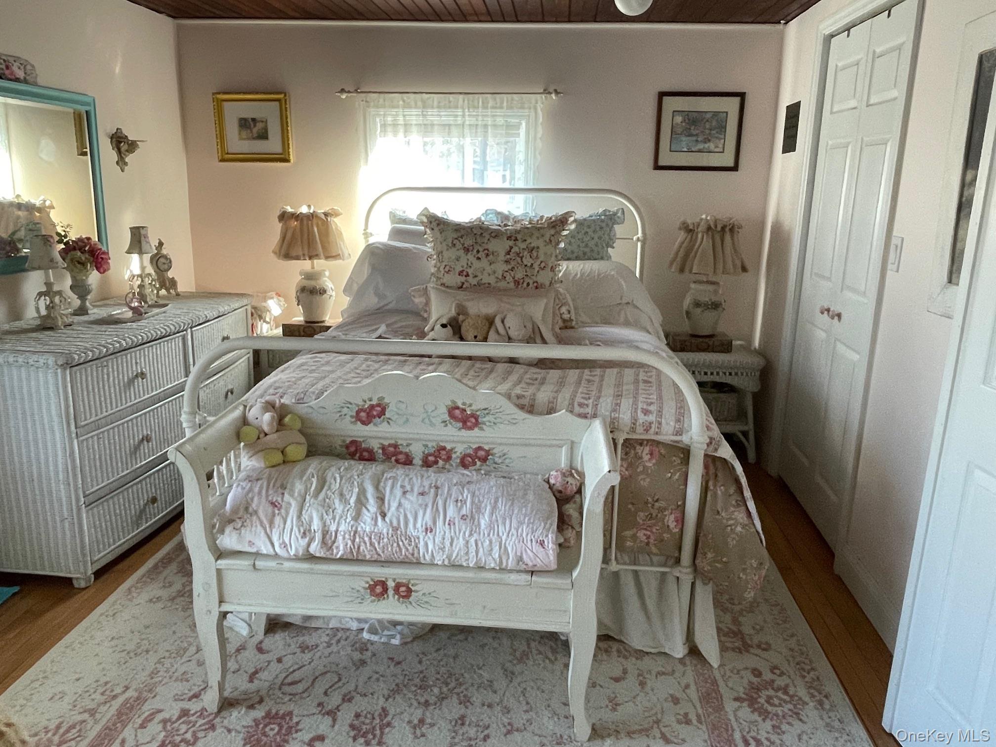 70 Shell Road Rocky Point, NY 11778 - Photo 8 of 31 Bedroom with wood ceiling, wood finished floors, and a closet