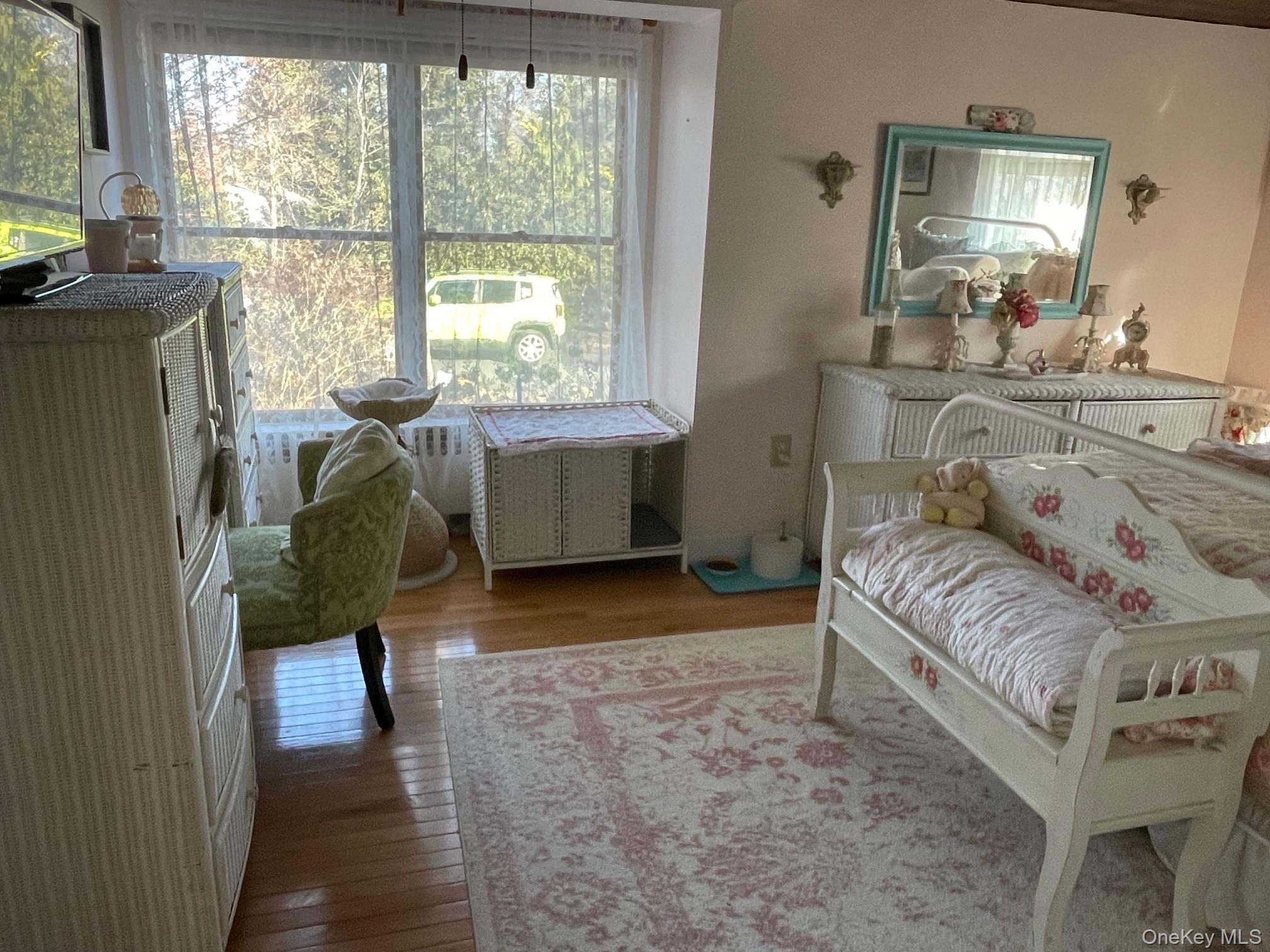 70 Shell Road Rocky Point, NY 11778 - Photo 9 of 31 Bedroom with wood-type flooring