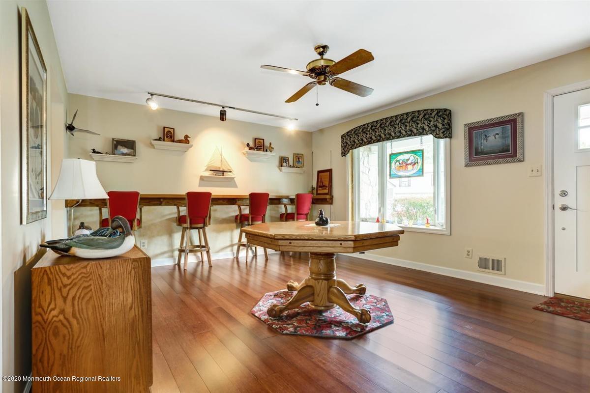 40 Hedgewood Road Howell, NJ 07731 - Photo 5 of 39 a living room with furniture kitchen view and a wooden floor