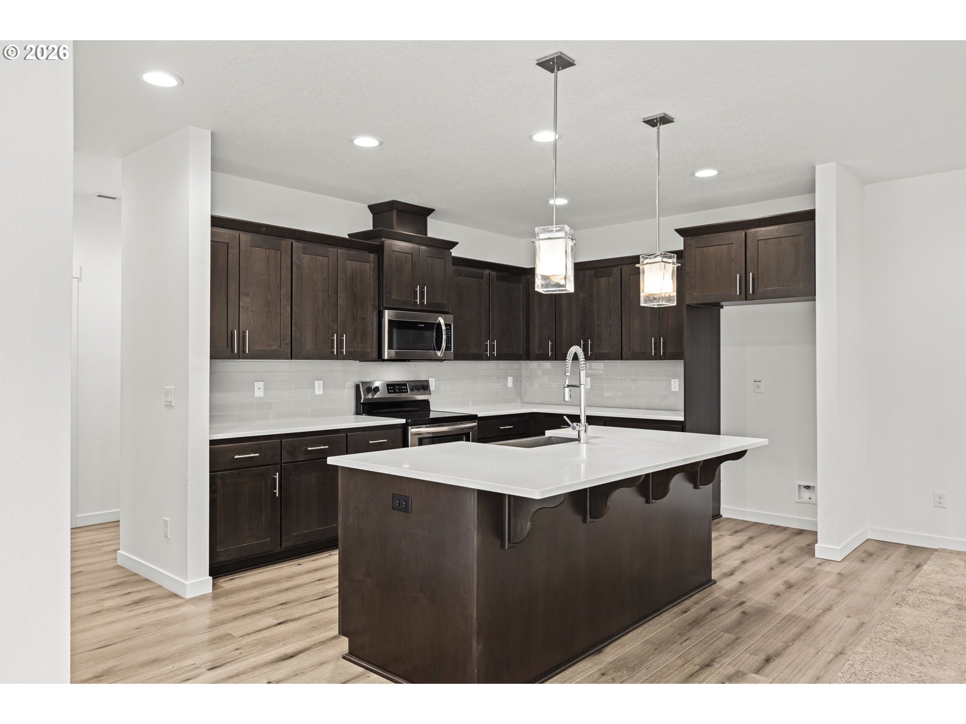 3513 Northeast Claire Road Estacada, OR 97023 - Photo 13 of 42 a kitchen with stainless steel appliances granite countertop a sink a stove and a refrigerator