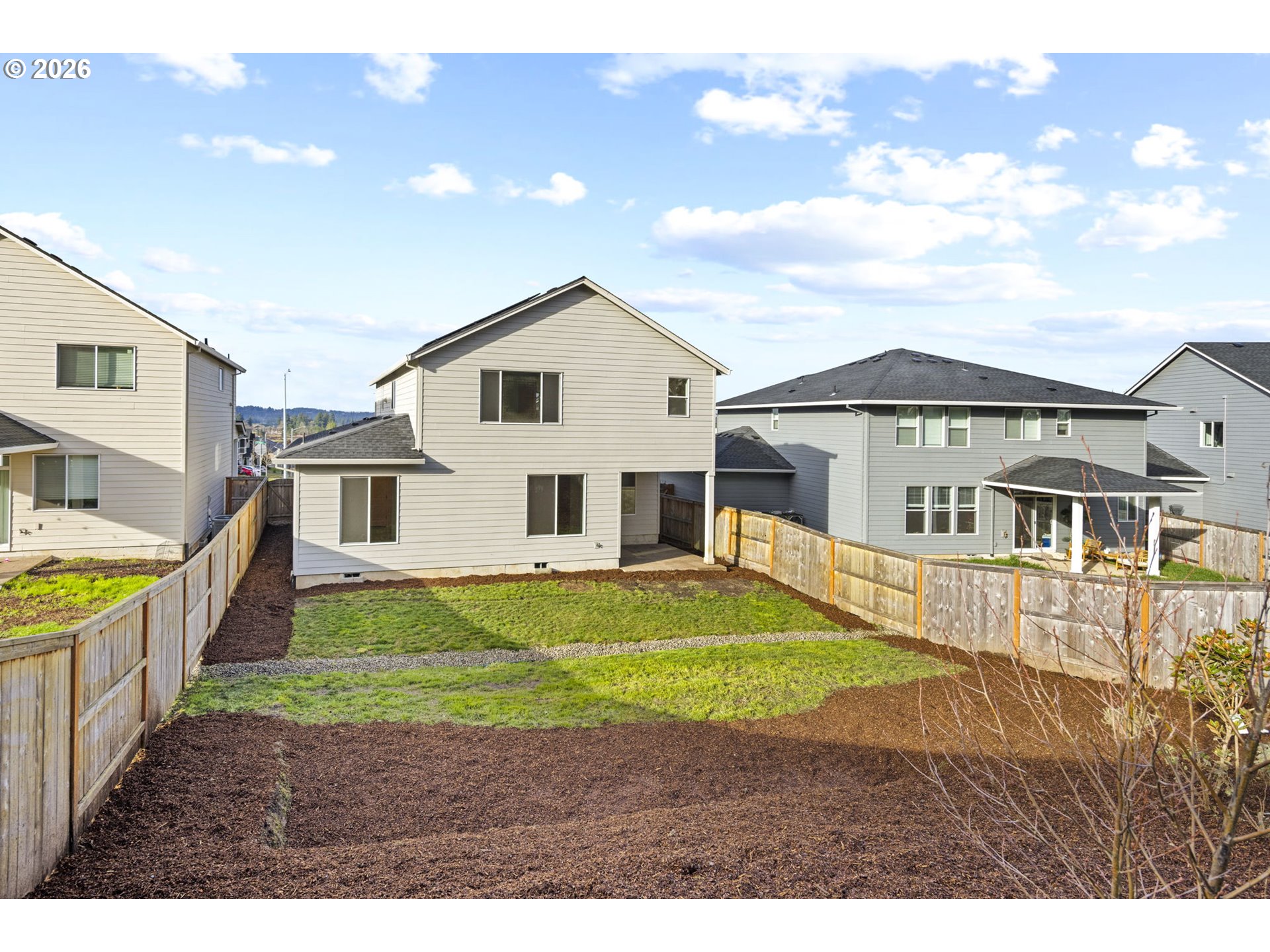 3513 Northeast Claire Road Estacada, OR 97023 - Photo 40 of 42 a view of a house with a big yard and large trees