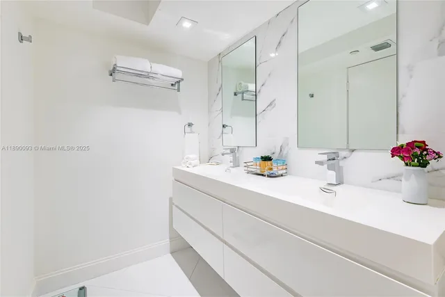 a kitchen with a stove and a refrigerator