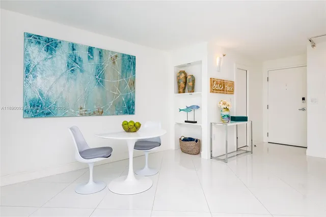 a bathroom with a toilet and a shower curtain