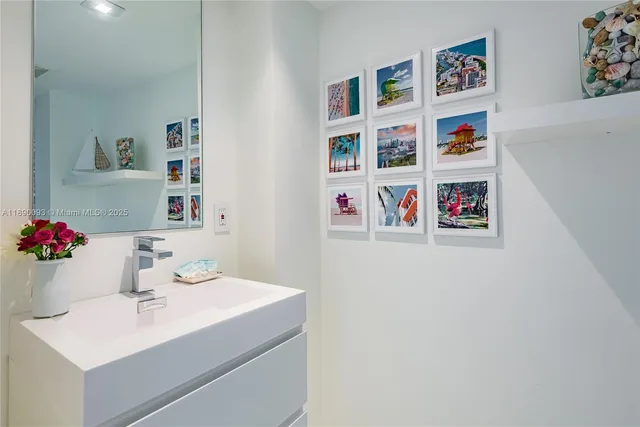 a city view from a balcony with seating space