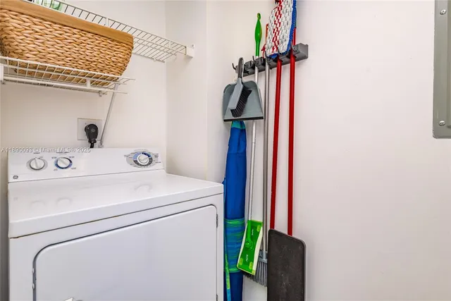 a balcony with table and chairs