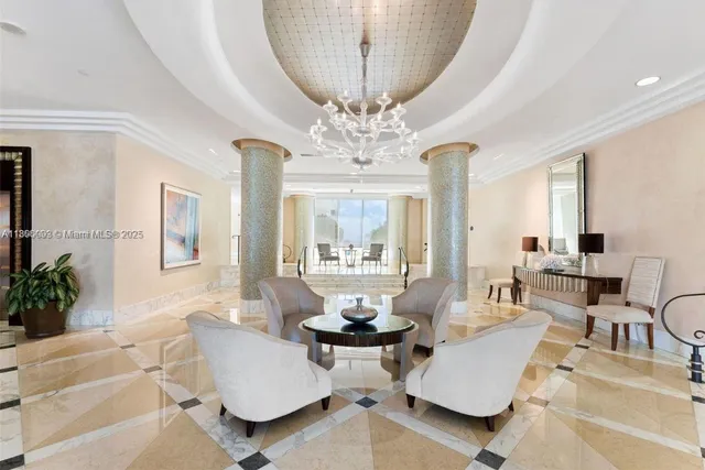 a living room with furniture a large window and a flat screen tv