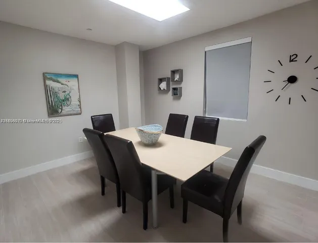 a view of balcony with furniture