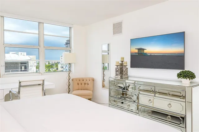 a close view of a vase with flowers on a table