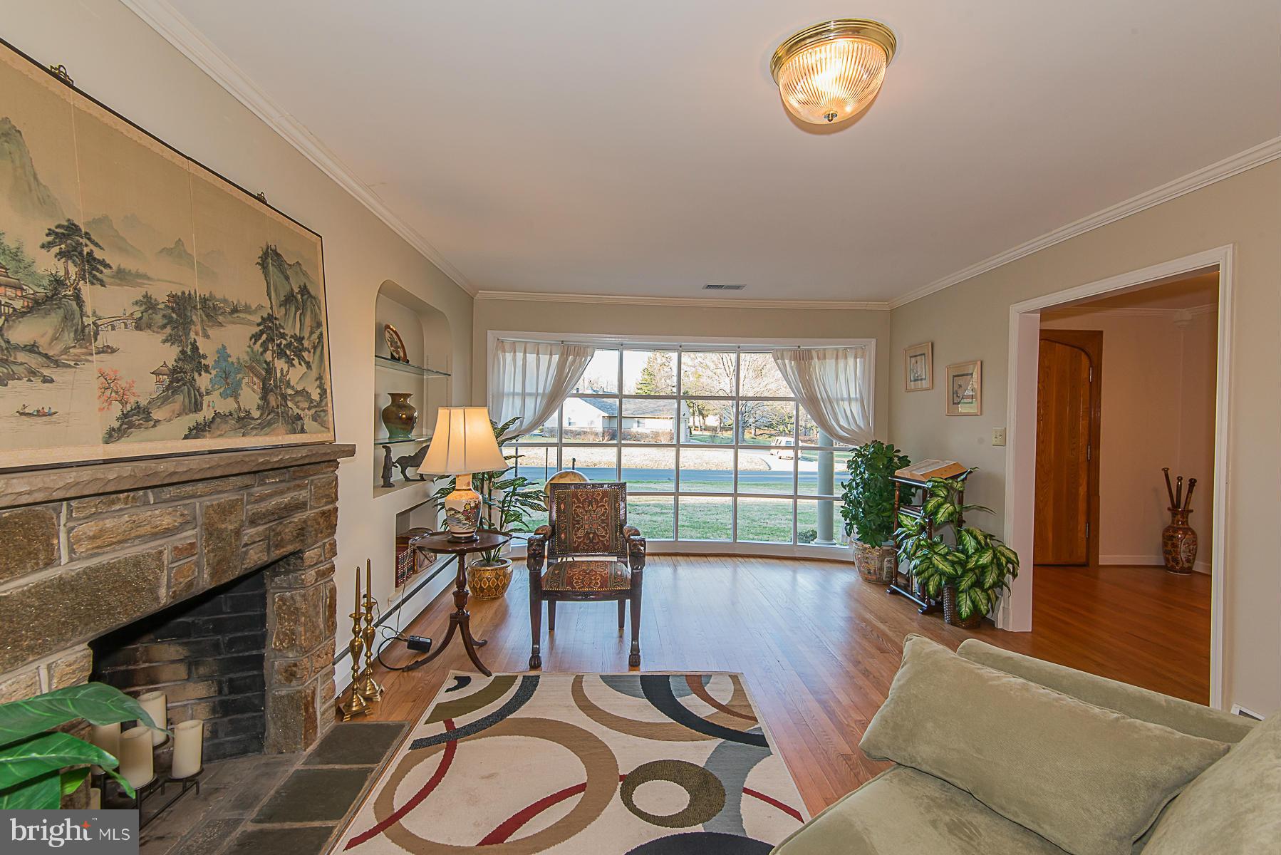 615 St Francis Road Towson, MD 21286 - Photo 8 of 30 a living room with furniture and a floor to ceiling window