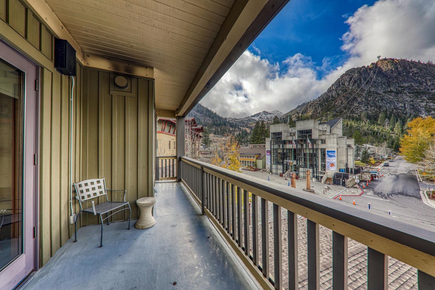 1985 Olympic Vly Road, Unit 2312 Olympic Valley, CA 96146 - Photo 16 of 27 a view of a porch with a table and chairs