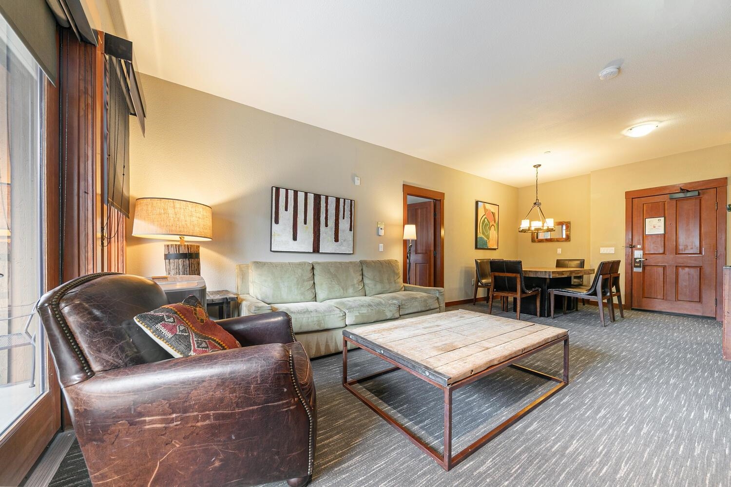 1985 Olympic Vly Road, Unit 2312 Olympic Valley, CA 96146 - Photo 21 of 27 a living room with furniture kitchen view and a large window