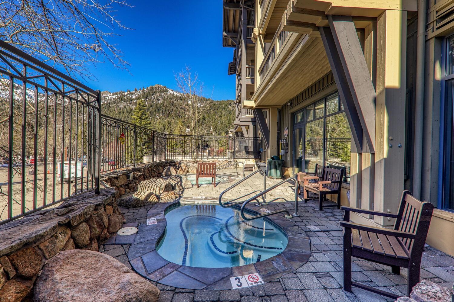 1985 Olympic Vly Road, Unit 2312 Olympic Valley, CA 96146 - Photo 10 of 27 a living room with patio furniture