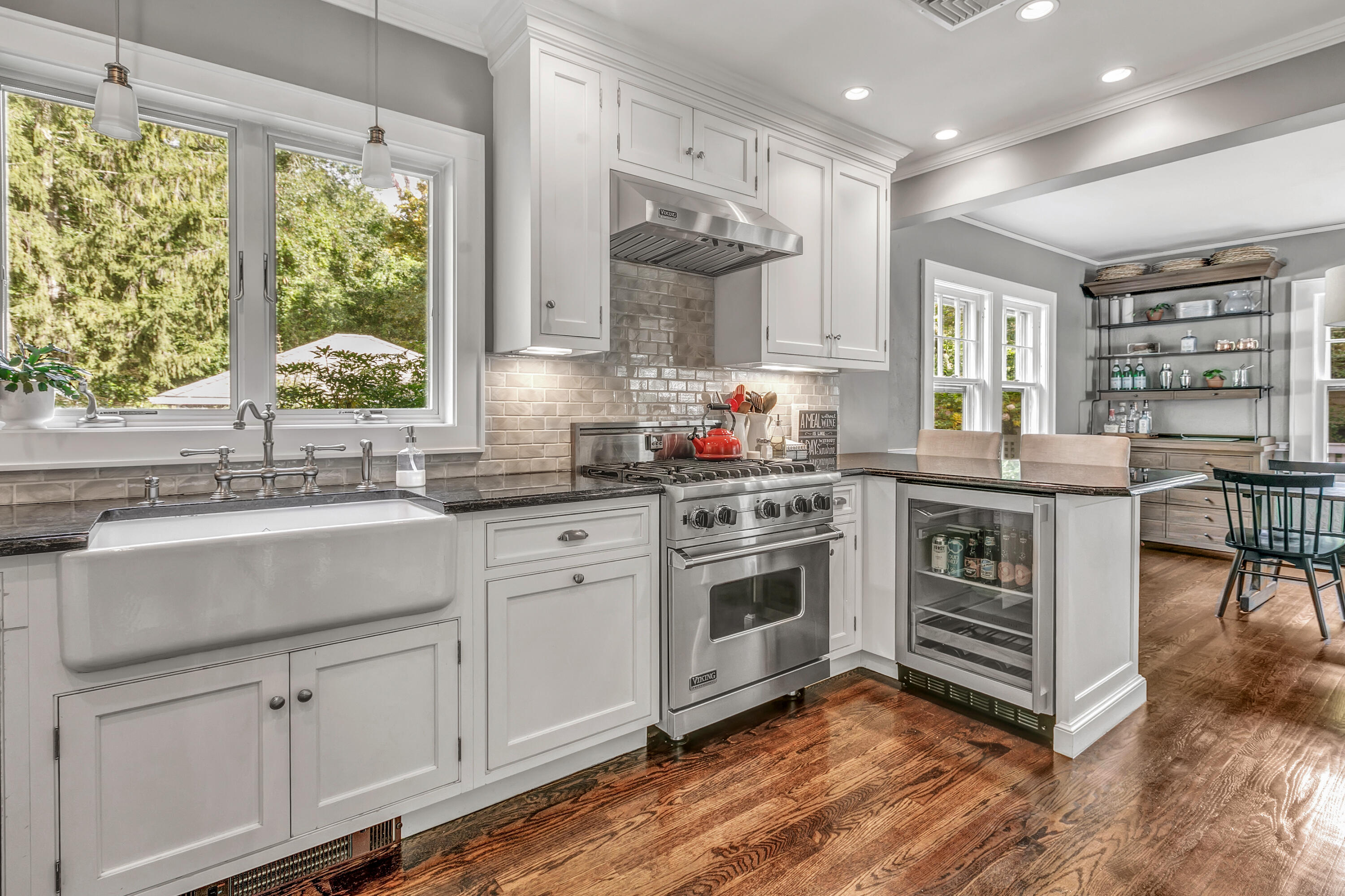 401 Jelliff Mill Road New Canaan, CT 06840 - Photo 12 of 21 a kitchen with stainless steel appliances a stove sink and cabinets