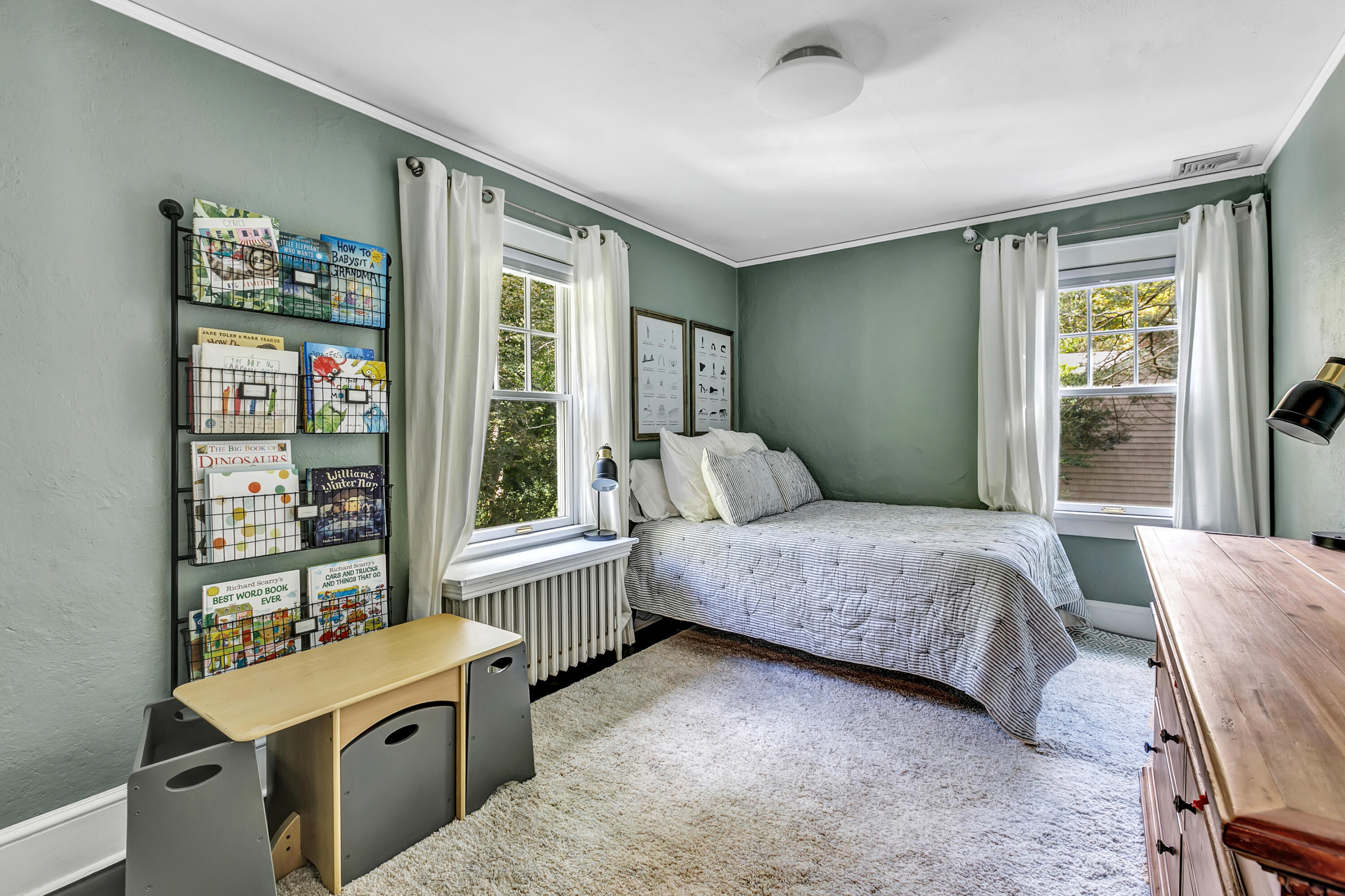 401 Jelliff Mill Road New Canaan, CT 06840 - Photo 19 of 21 a bedroom with a bed and a window