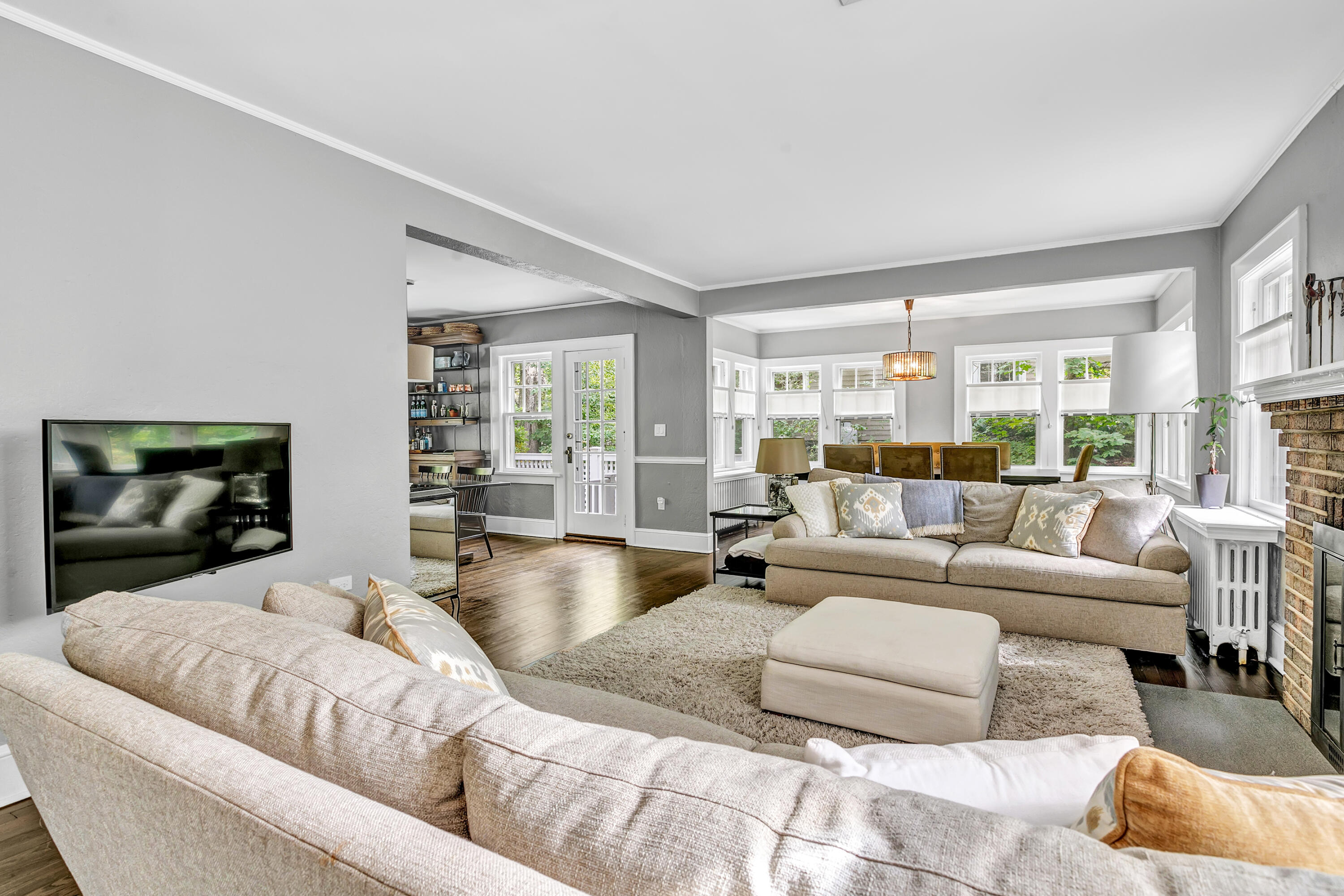 401 Jelliff Mill Road New Canaan, CT 06840 - Photo 4 of 21 a large bedroom with a large bed and a large window