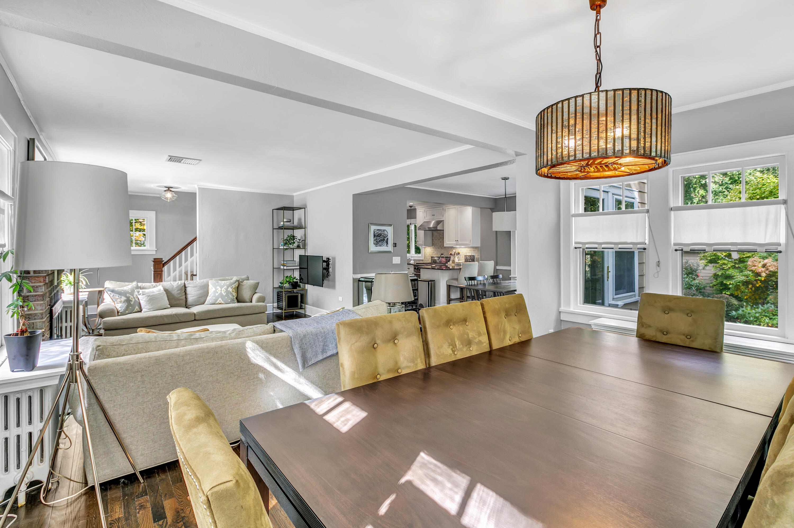 401 Jelliff Mill Road New Canaan, CT 06840 - Photo 7 of 21 a living room with furniture and a chandelier