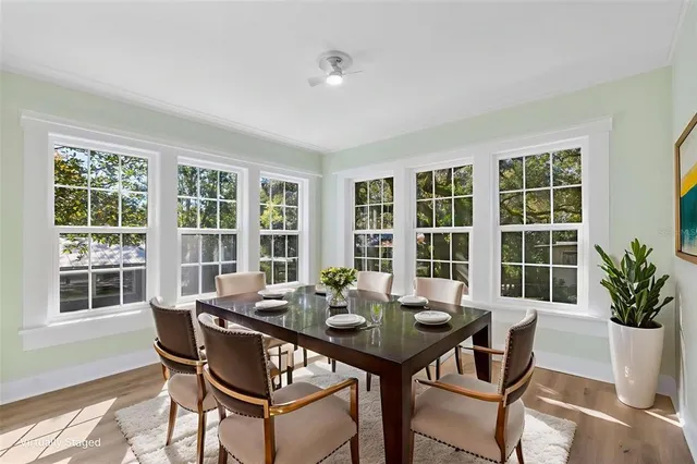 a view of a dining room with furniture window and outside view