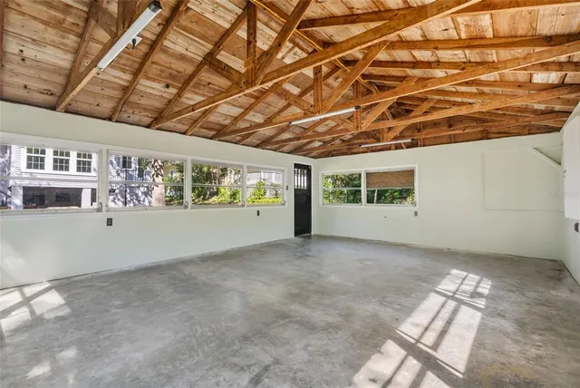 a view of a city with lush green forest