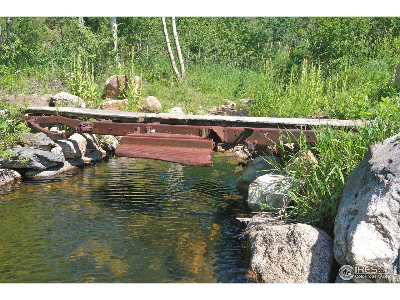 9648 Highway 36 Lyons, CO 80540 - Photo 4 of 31 a view of swimming pool from a balcony