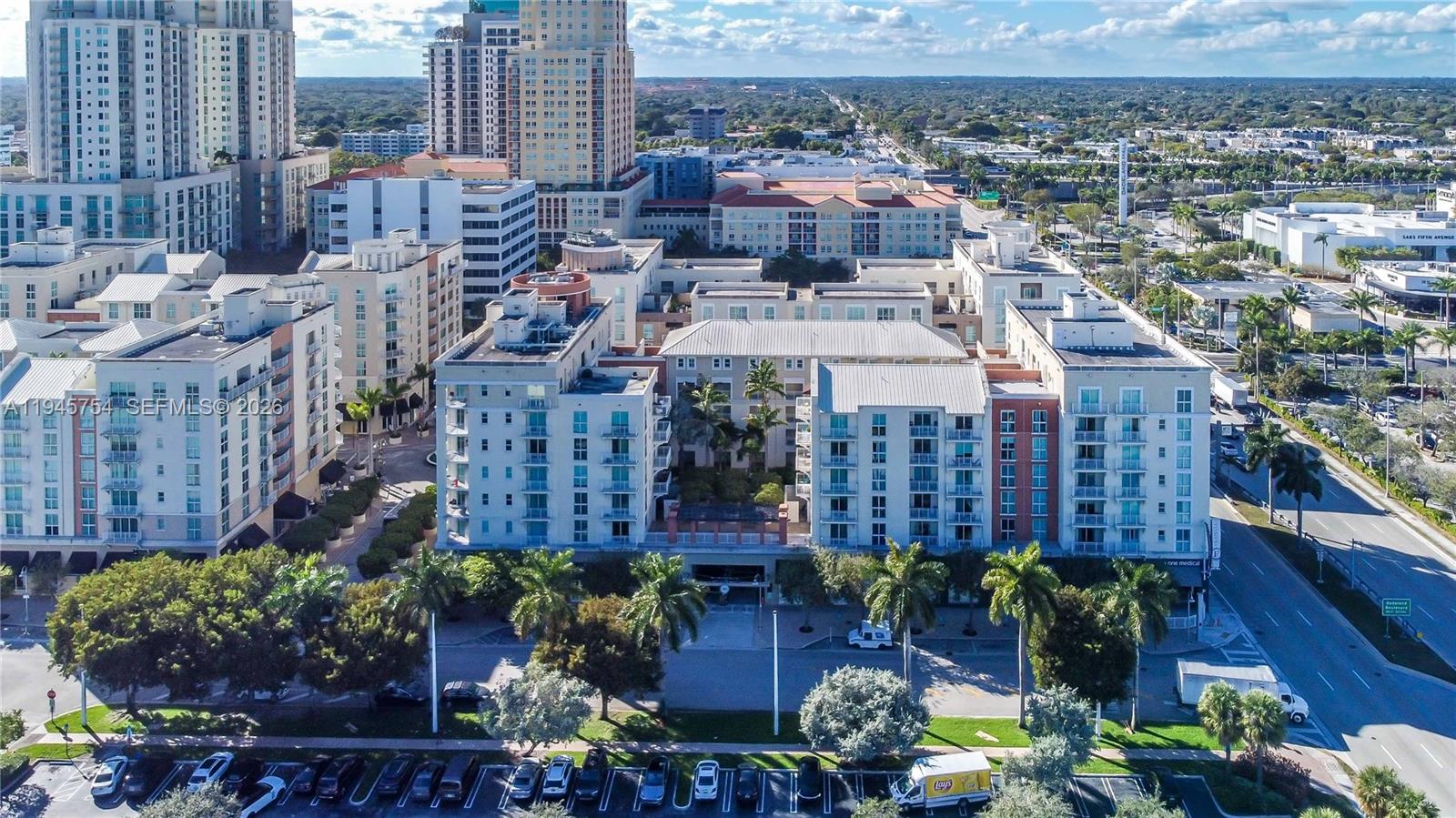 7275 Southwest 89th Street, Unit B416 Miami, FL 33156 - Photo 26 of 32 a picture of outdoor space with lots of plants and trees
