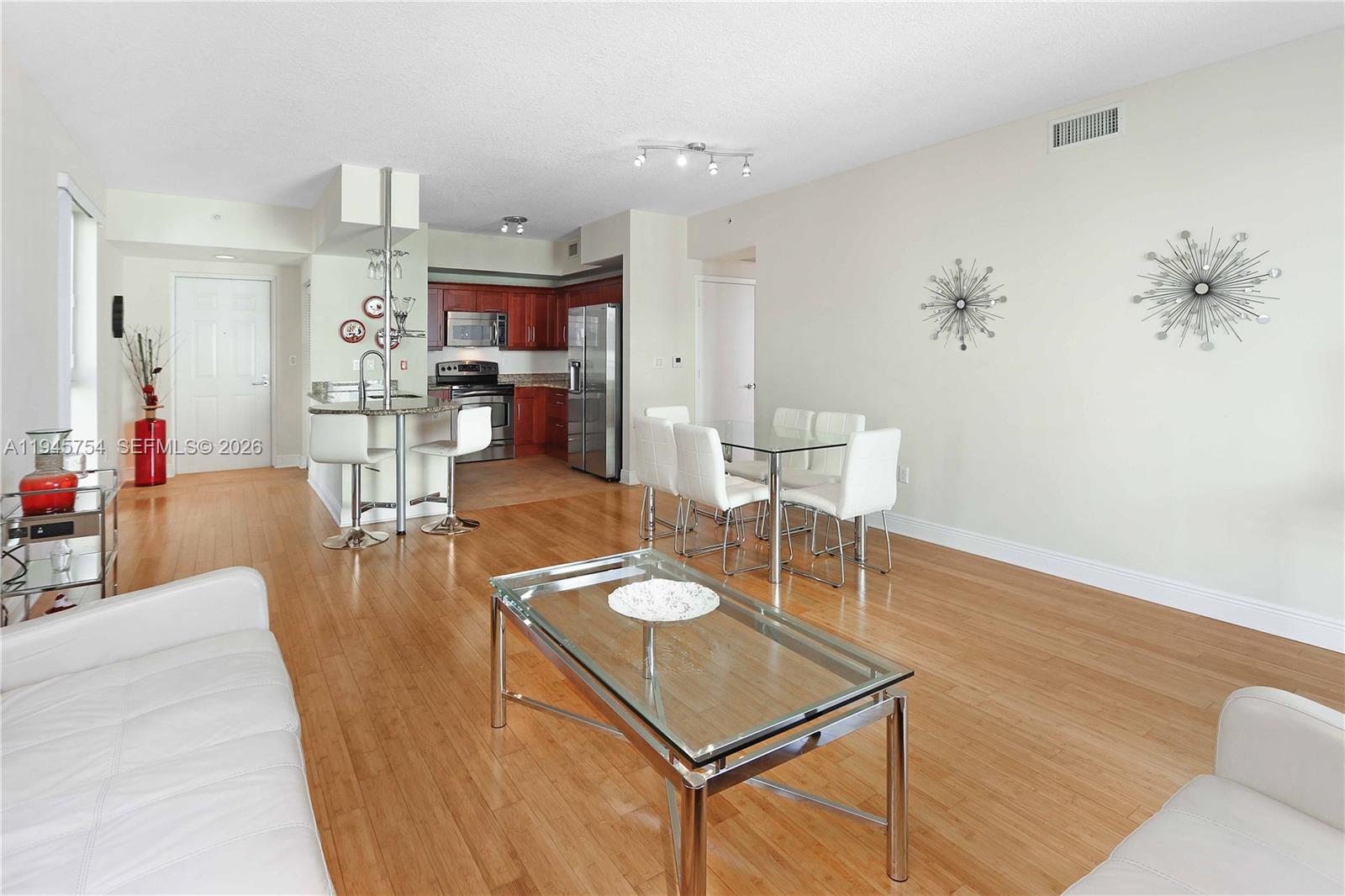 7275 Southwest 89th Street, Unit B416 Miami, FL 33156 - Photo 4 of 32 a living room with furniture