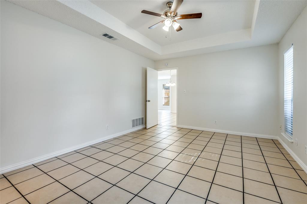 8940 Thompson Circle Frisco, TX 75033 - Photo 11 of 15 a view of an empty room and window