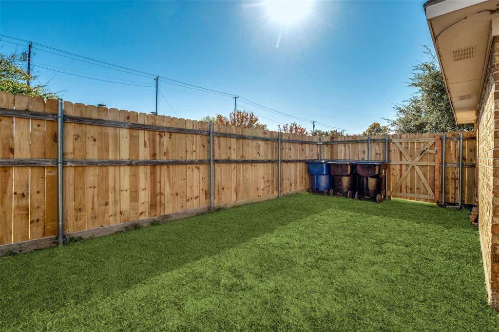 8940 Thompson Circle Frisco, TX 75033 - Photo 15 of 15 a view of a backyard with a garden