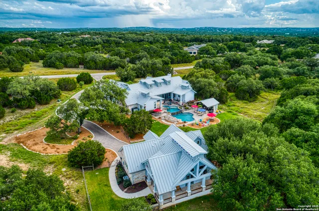 a front view of a house with a yard and porch