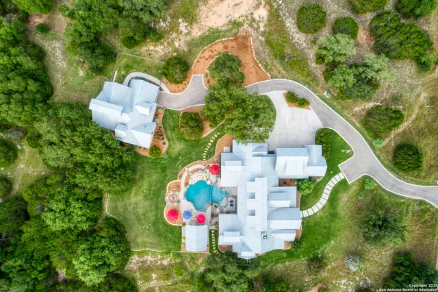 a front view of a house with a yard and porch