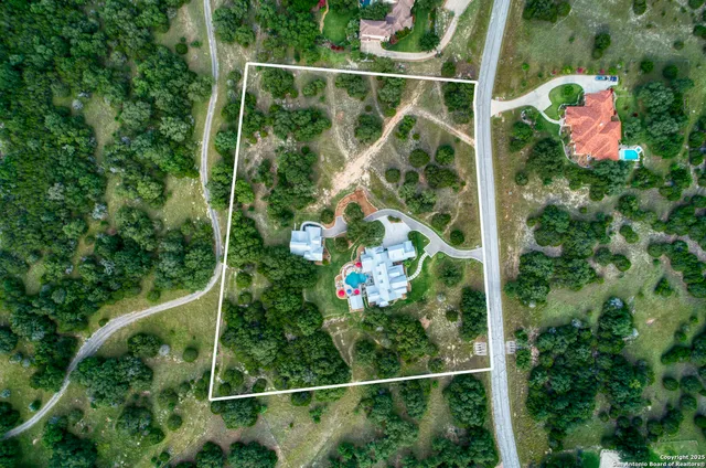 a view of a livingroom with furniture and hardwood floor