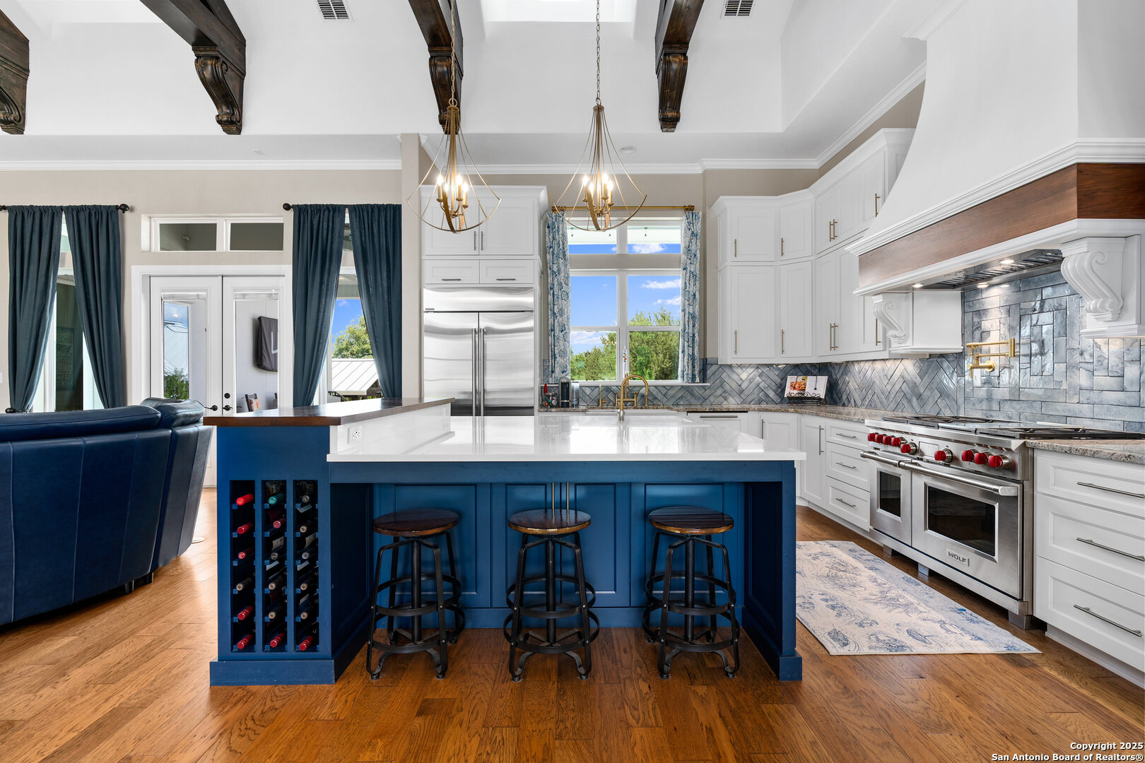 30 VERDE Point Boerne, TX 78006 - Photo 24 of 62 a kitchen with wooden floors and wooden cabinets
