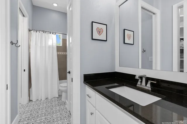 an outdoor space with furniture and umbrella