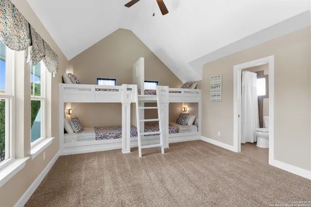 a view of a house with backyard and porch