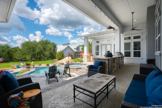 a view of workspace with wooden floor windows