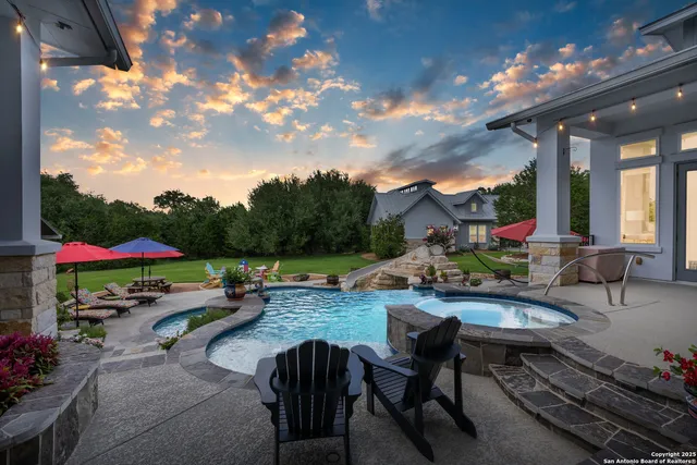 a view of a patio with couches chairs and a potted plant