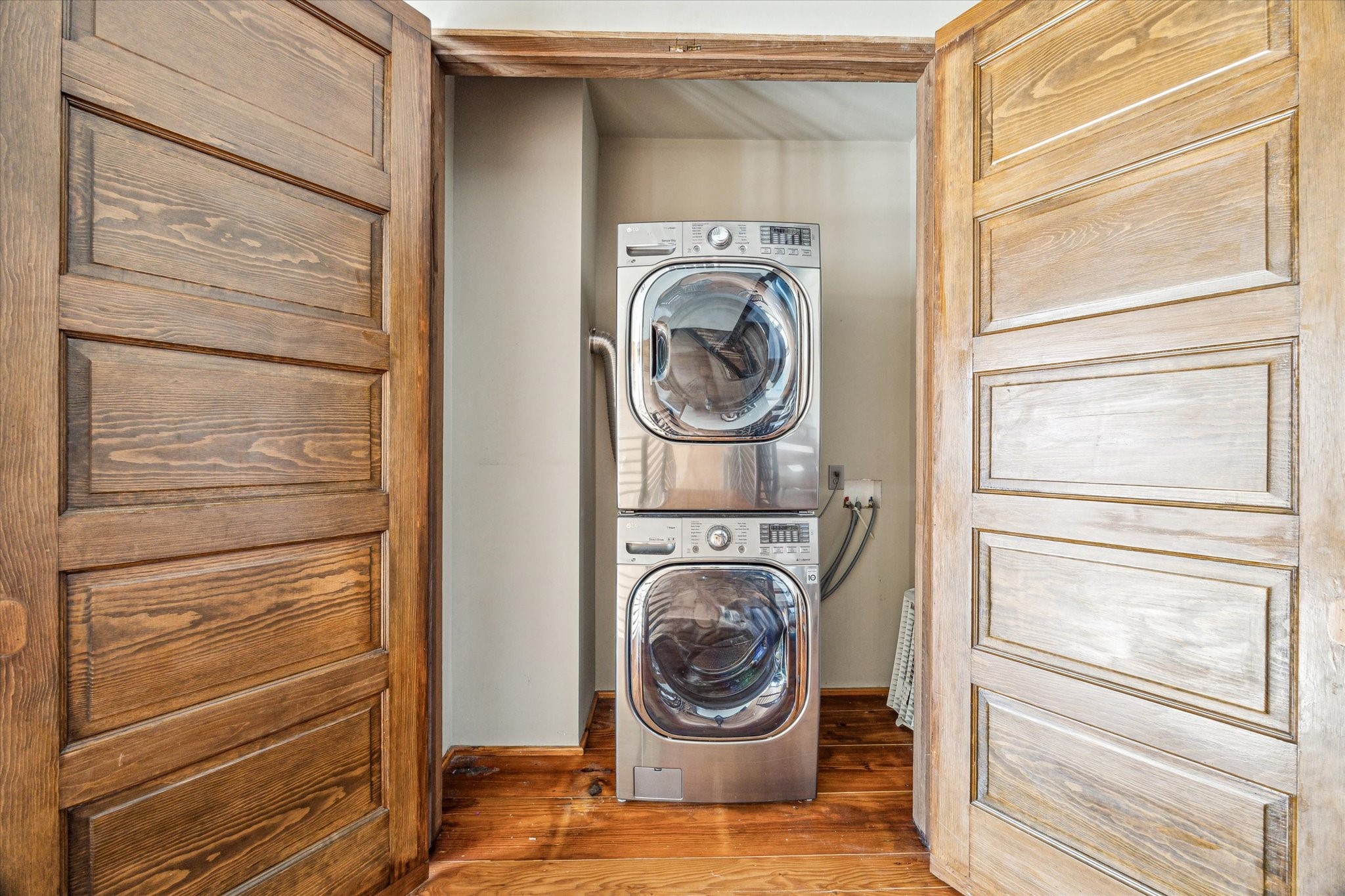 808 Coronado Street Houston, TX 77009 - Photo 19 of 50 Unit 1, utility closet conveniently located in the hallway between bedrooms with stacked washer and dryer.