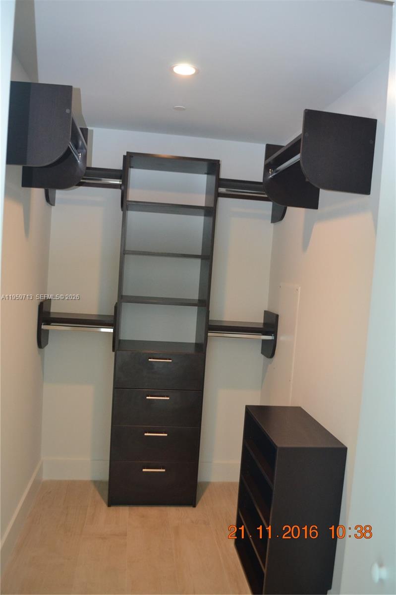 1080 Brickell Avenue, Unit 2003 Miami, FL 33131 - Photo 7 of 17 WALKING CLOSET